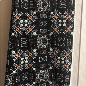 LuLaRoe Black Cassie Skirt with Colorful Geometric Pattern in Black Coral and Tu